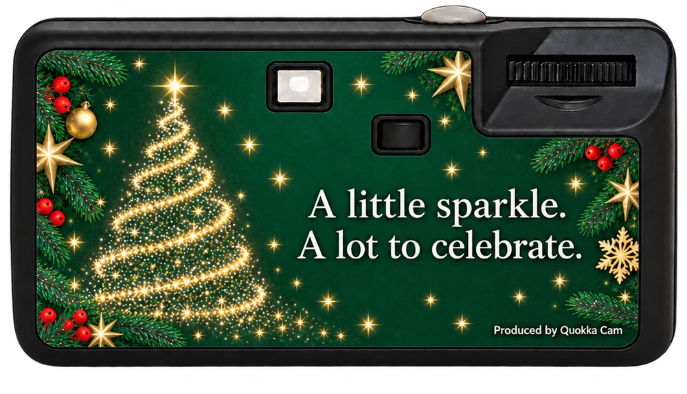 Back of the same disposable camera: a golden Christmas tree and the line A little sparkle. A lot to celebrate.