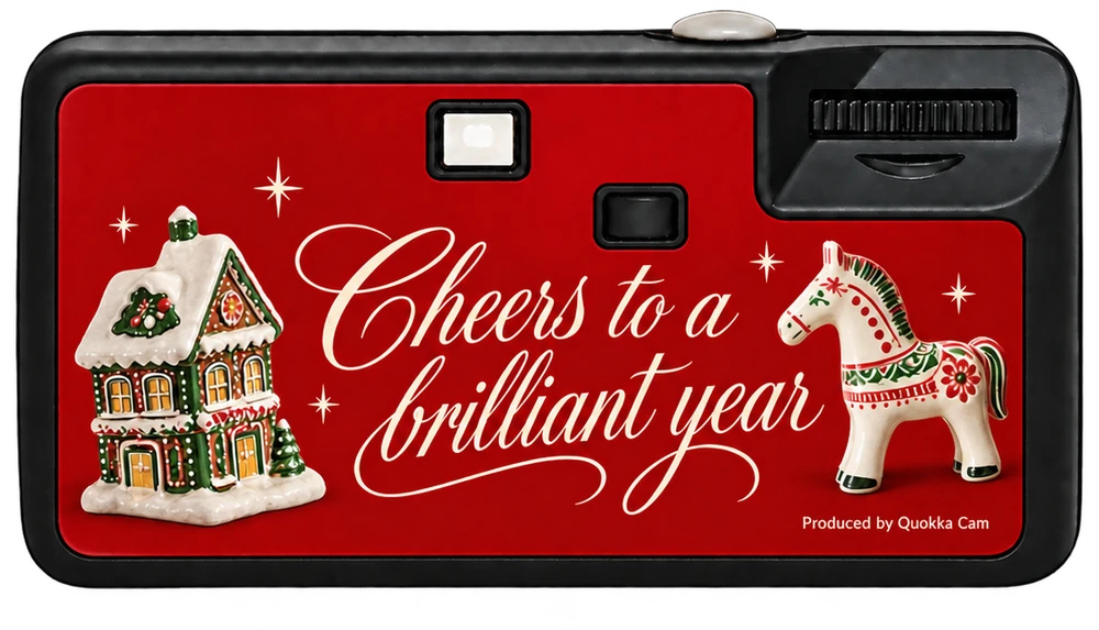 Back of the same disposable camera: a gingerbread house, a painted horse and the line Cheers to a brilliant year