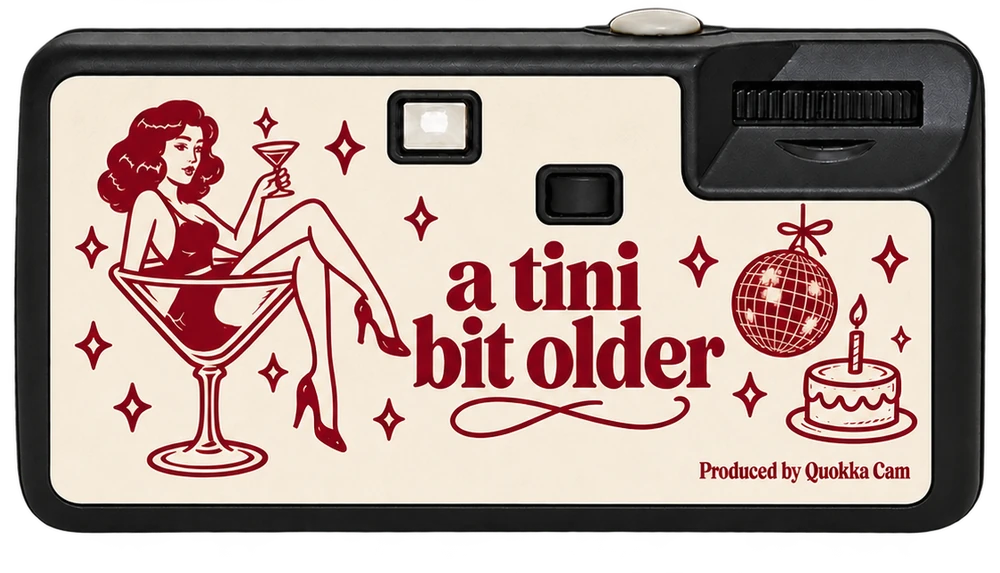 Back of the same disposable camera: a pin-up in a martini glass and the line a tini bit older