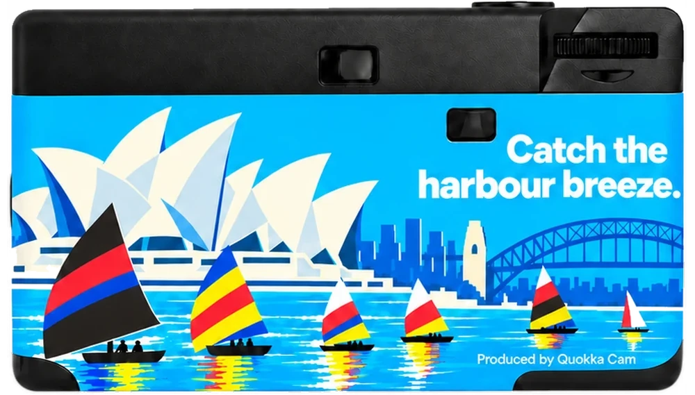 Back of the same disposable camera: the harbour, the Opera House and sailboats, and the line Catch the harbour breeze.